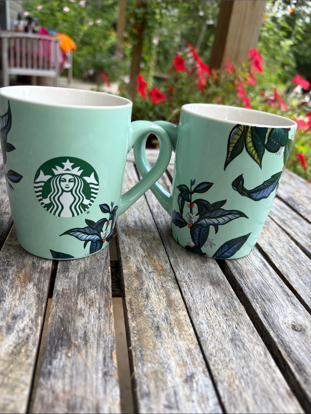 Pair of Starbucks Mint Green Ceramic Mugs with Navy Leaf Motif 10 oz.
